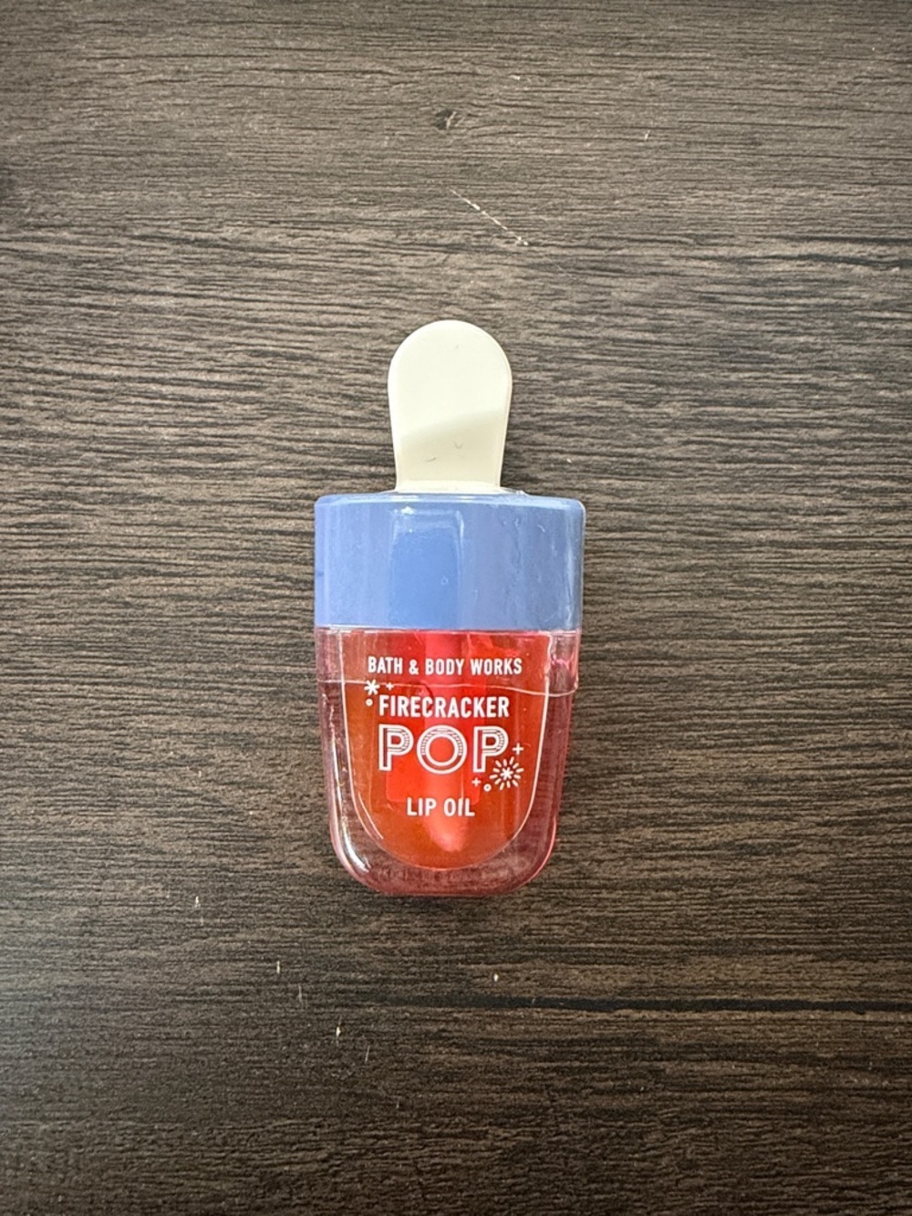 Bath & Body Works Firecracker Pop Lip Oil - Red with Light Blue Cap